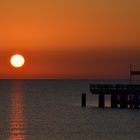 Sonnenaufgang an der Seebrücke Schönberger Strand