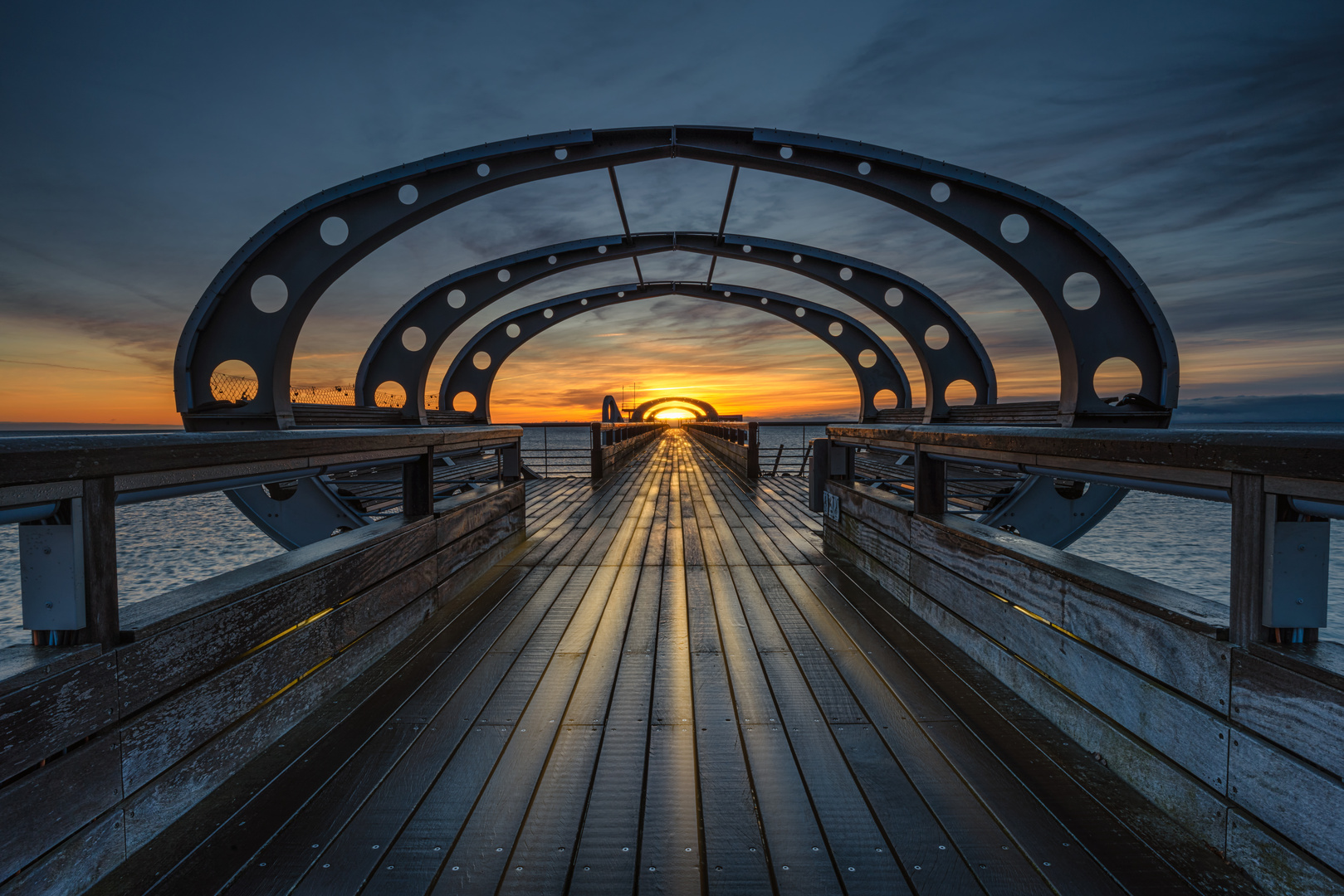 Sonnenaufgang an der Seebrücke von Kellenhusen