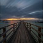 Sonnenaufgang an einem Bootssteg am Ammersee 