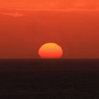 Sonnenaufgang auf Fuerteventura mit Sonnenfleck