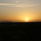 Sonnenaufgang bei den Olgas, Blick zum Uluru