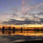 Sonnenaufgang bei Hochwasser am Rhein