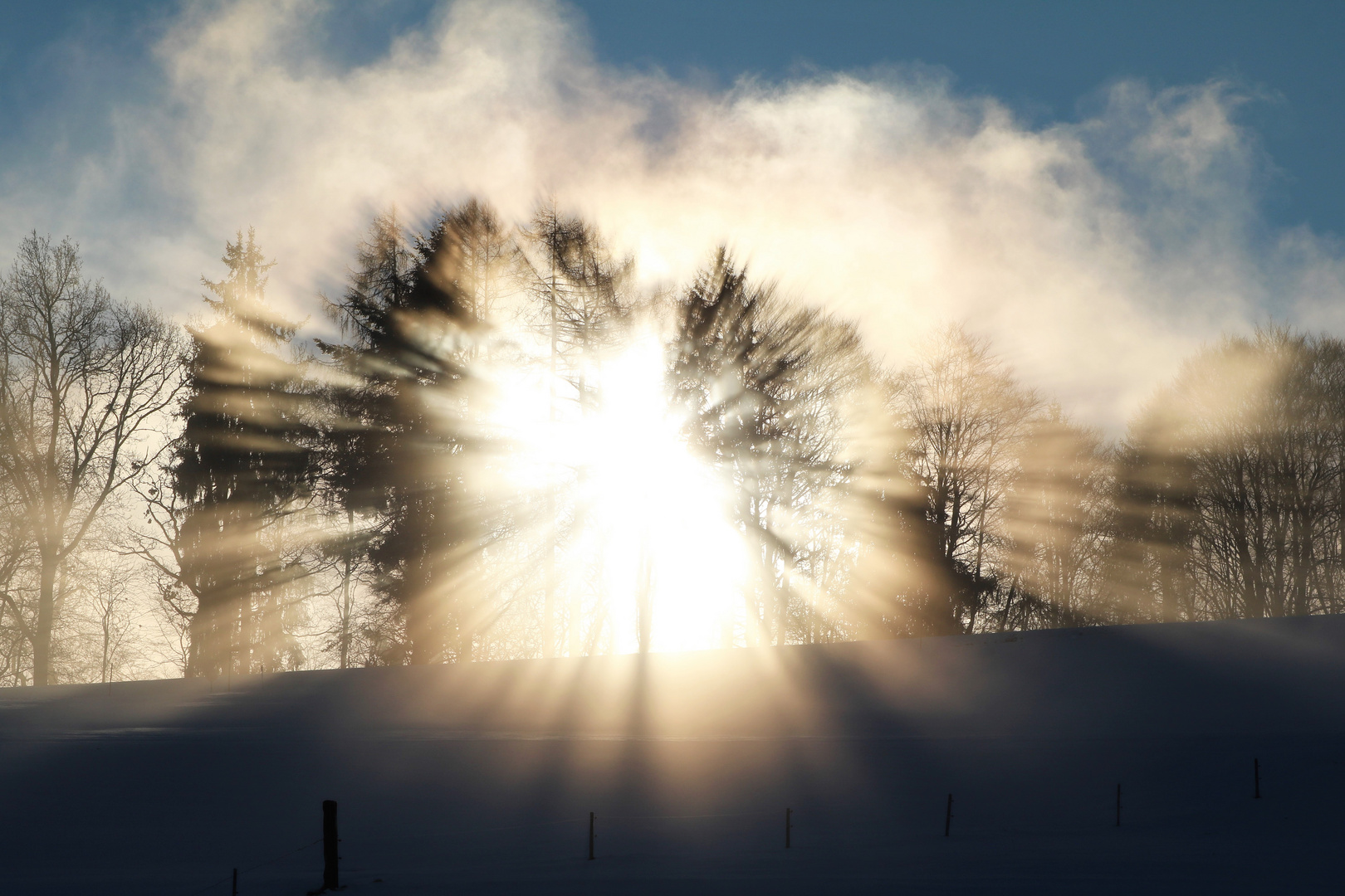 Sonnenaufgang bei Nebel