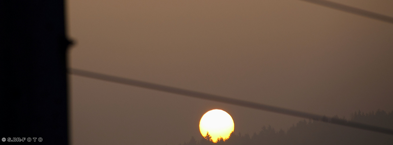 Sonnenaufgang bei Nebel