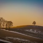 Sonnenaufgang hinterm Hügel