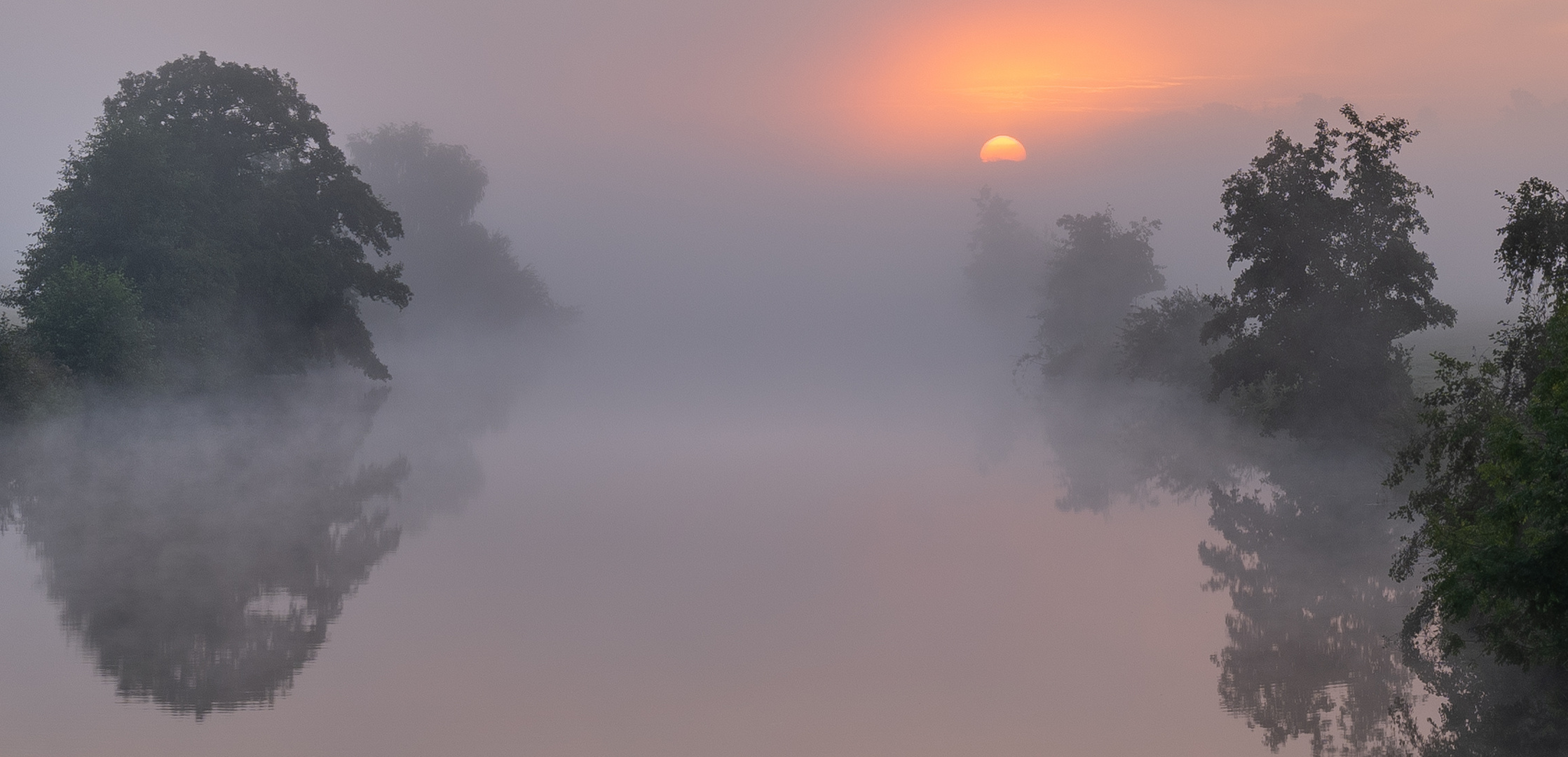 Sonnenaufgang im Nebel