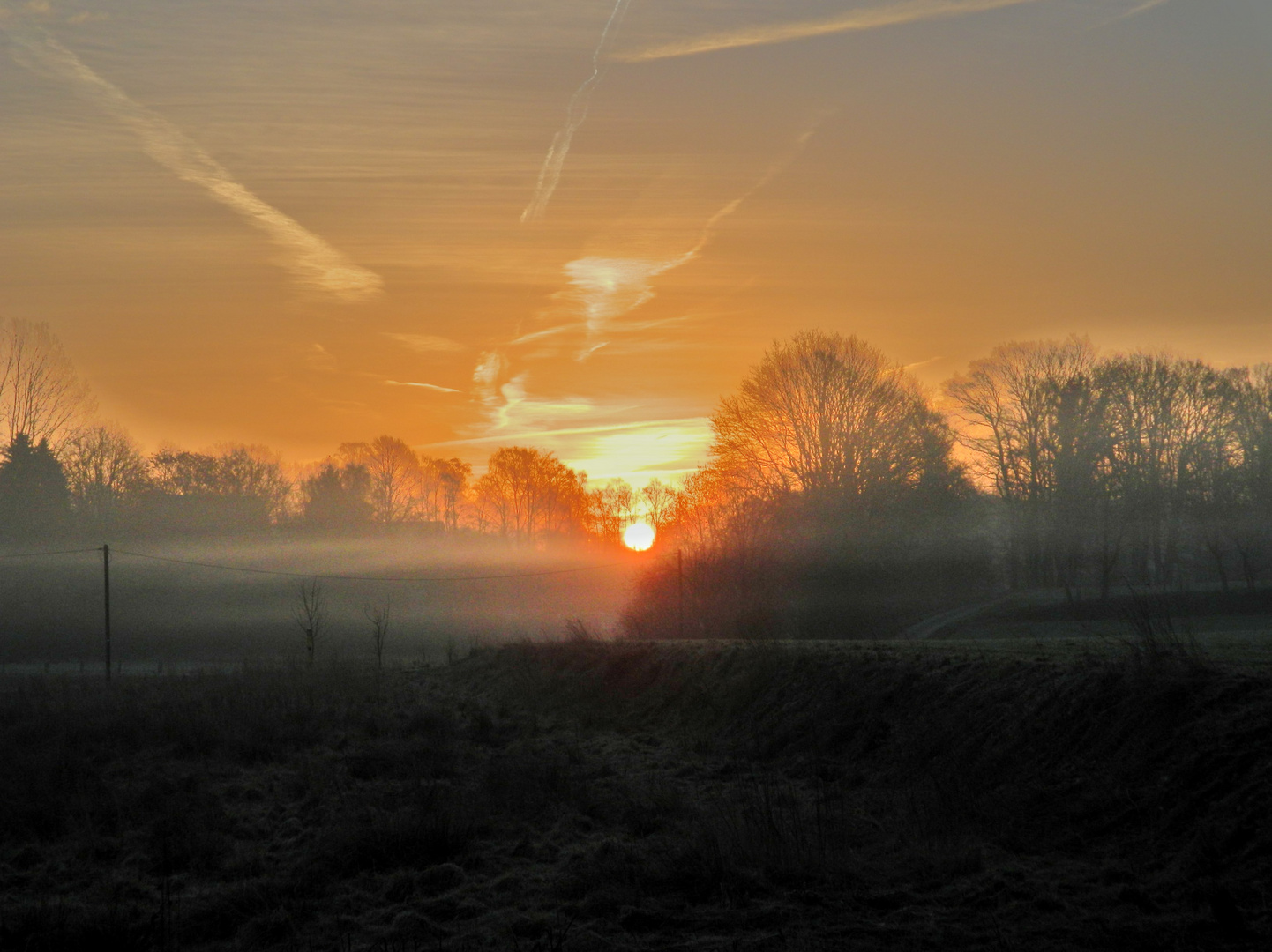 Sonnenaufgang im Nebel