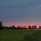 Sonnenaufgang in die Wolke