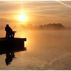 Sonnenaufgang mit Angler