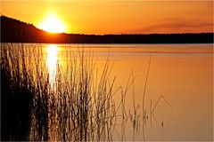 Sonnenaufgang mit dünner Eisschicht