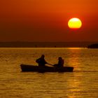 Sonnenaufgang mit einem Boot, Balaton