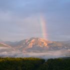 Sonnenaufgang mit Regenbogen