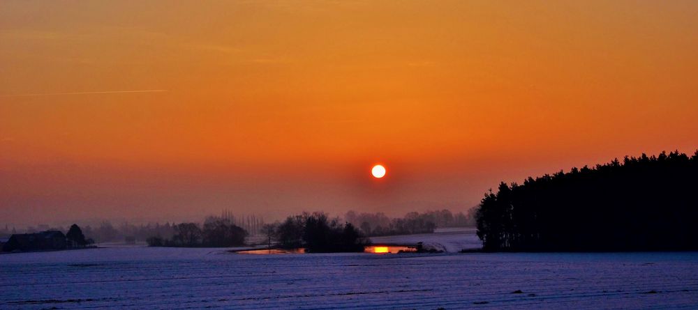 Sonnenaufgang mit Schnee