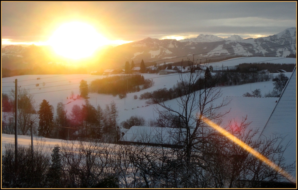 Sonnenaufgang über den Alpen