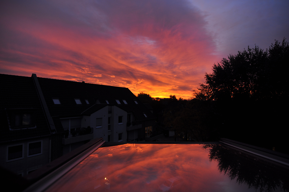 Sonnenaufgang über den Dächern von GE