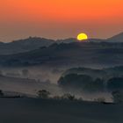 *Sonnenaufgang über den Feldern der Crete Senesi*