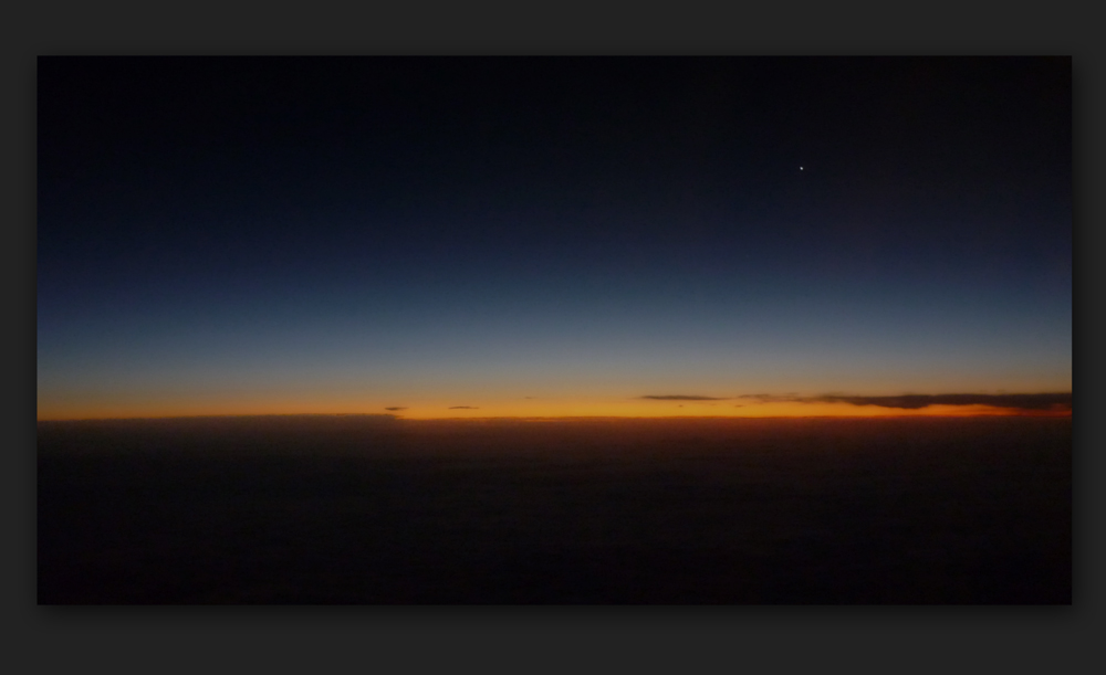 Sonnenaufgang über den Wolken