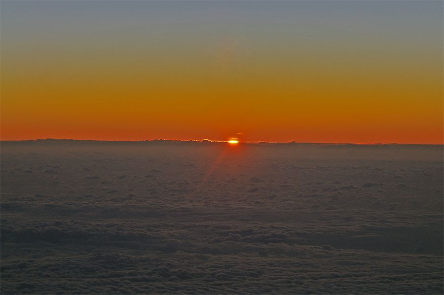 Sonnenaufgang über den Wolken