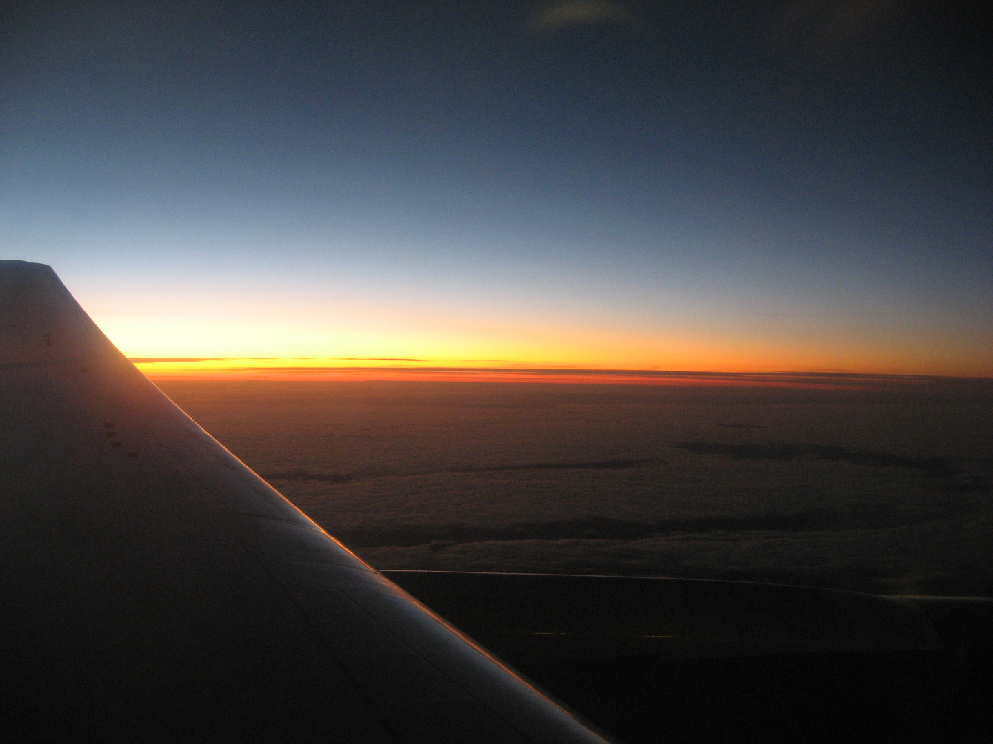 Sonnenaufgang über den Wolken