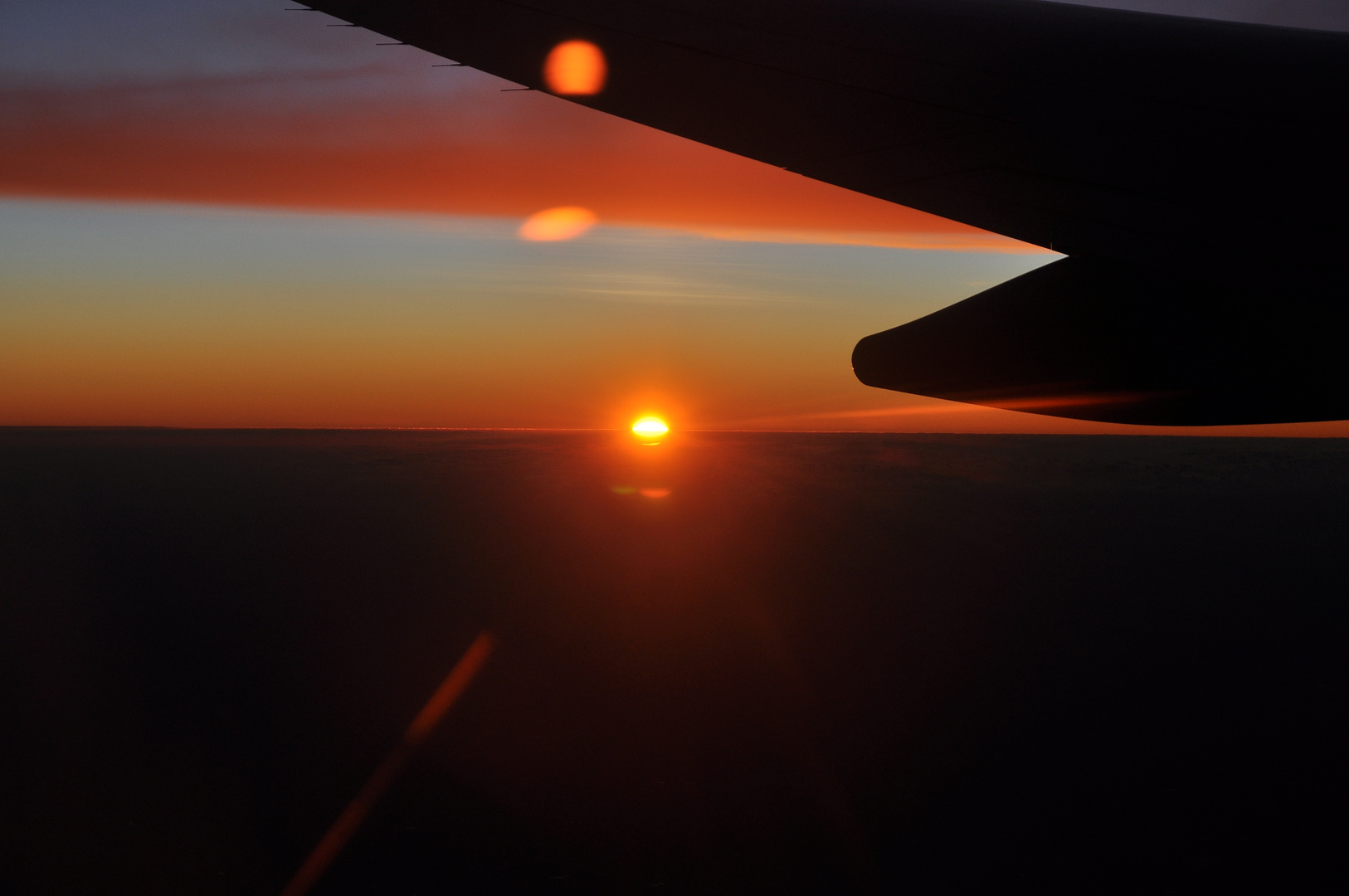 Sonnenaufgang über den Wolken