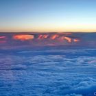 Sonnenaufgang über den Wolken