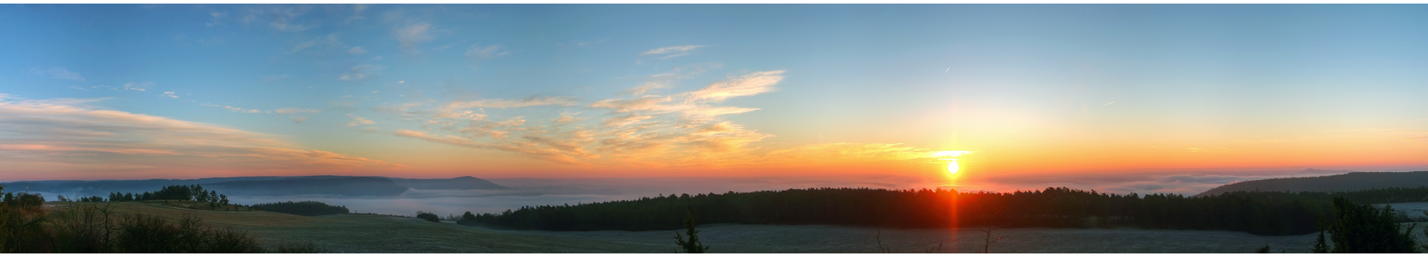 Sonnenaufgang über der Inversion