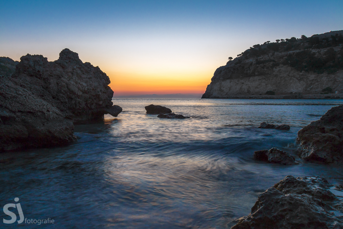 Sonnenaufgang über der Ladiko Bay, Rhodos