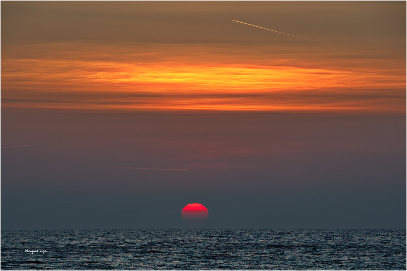 Sonnenaufgang über der Ostsee am Strand von Sellin...