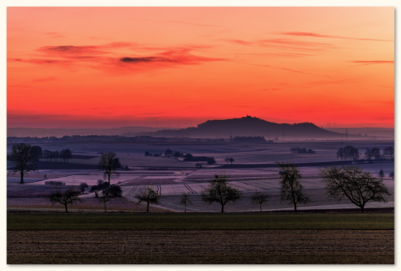 Sonnenaufgang und Blick von Marburg nach Amöneburg