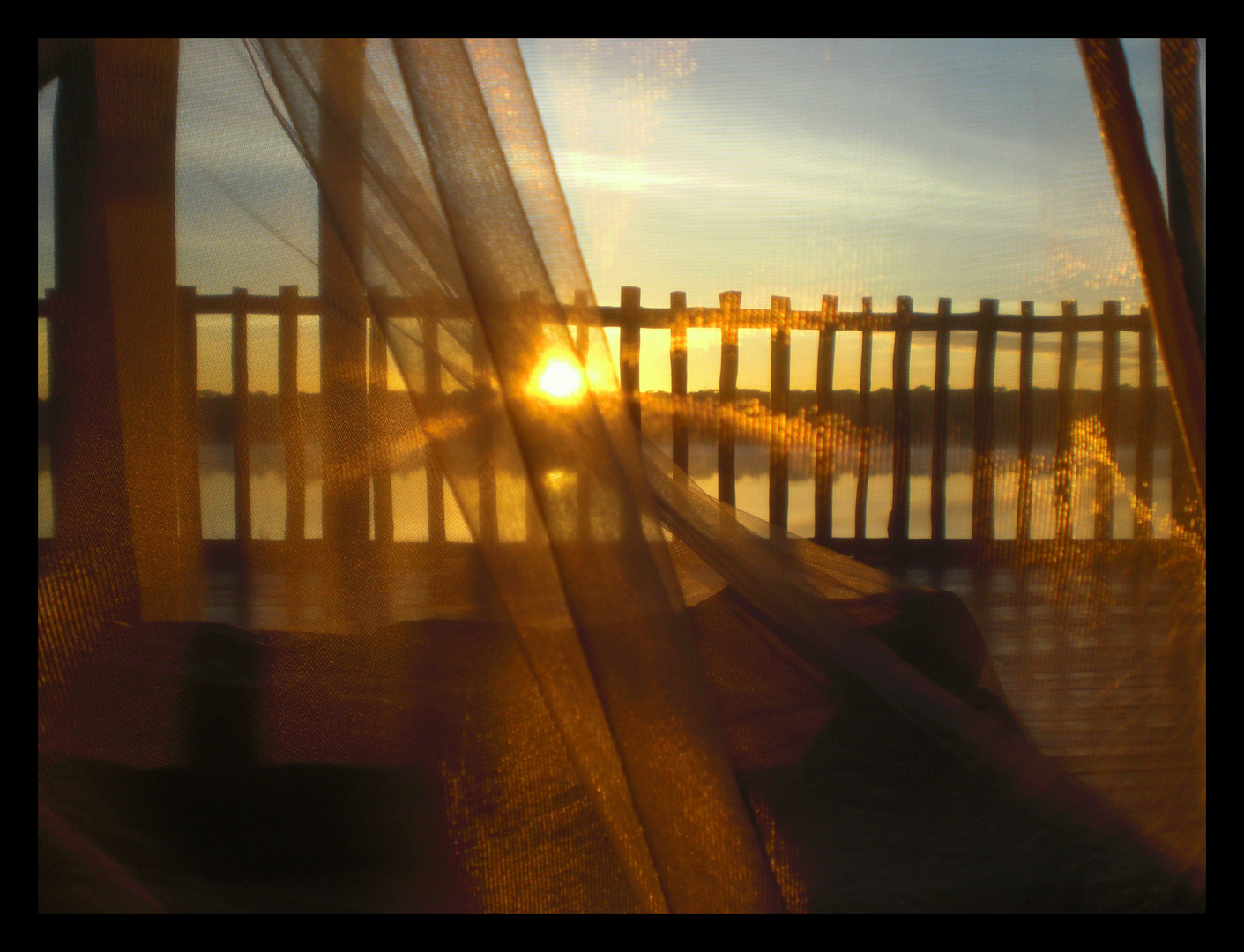 Sonnenaufgang unterm Mosquitonetz