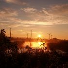 Sonnenaufgang vor dem Windpark