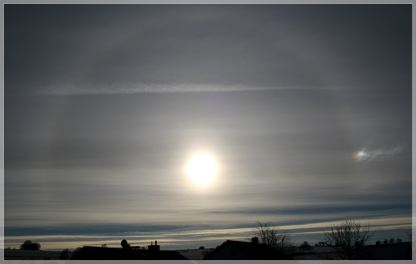 Sonnenhalo und Nebensonne