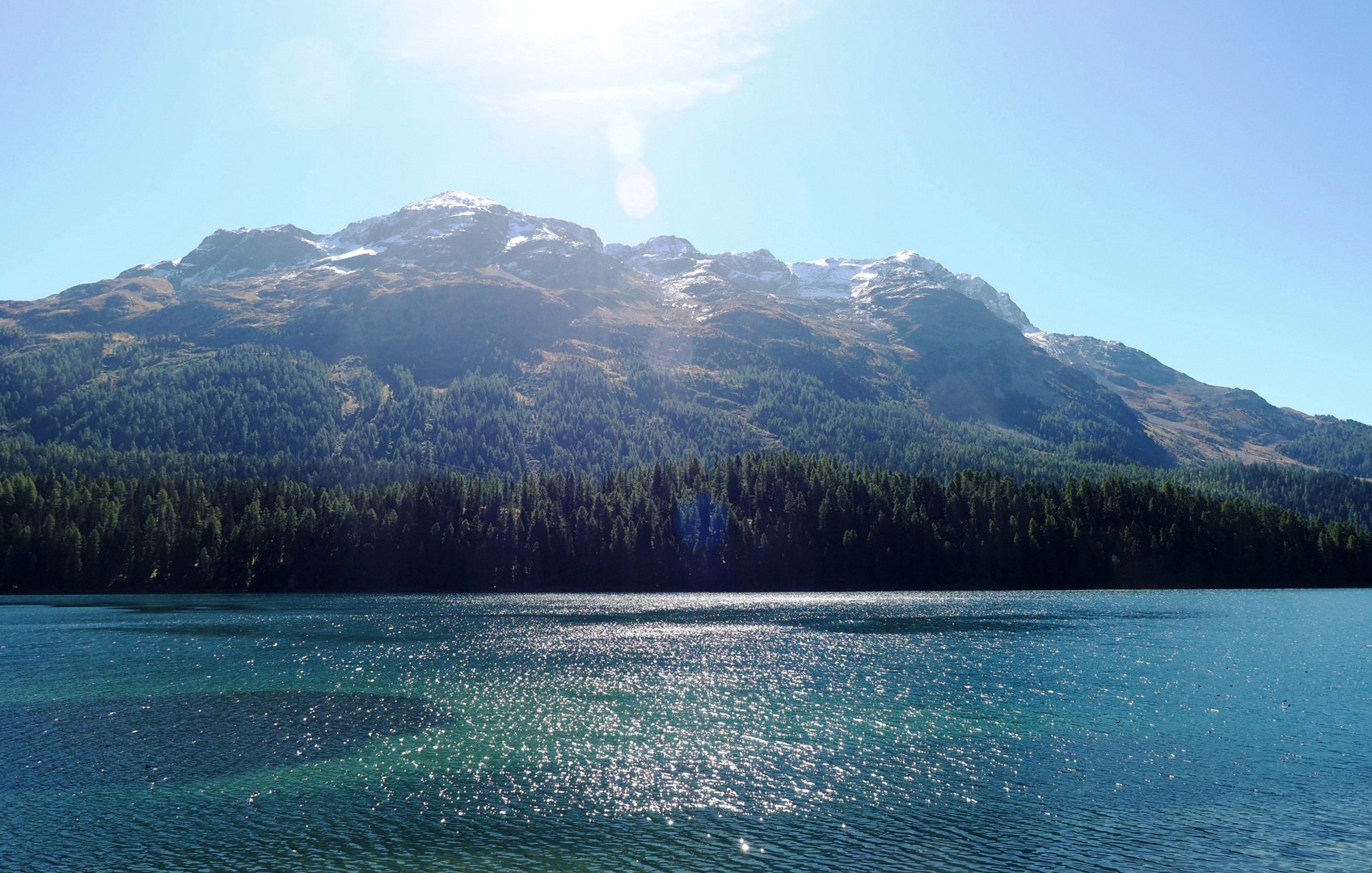 Sonnenreflexe im St. Moritzersee