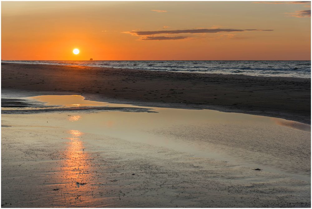 Sonnenspiegelung bei Ebbe