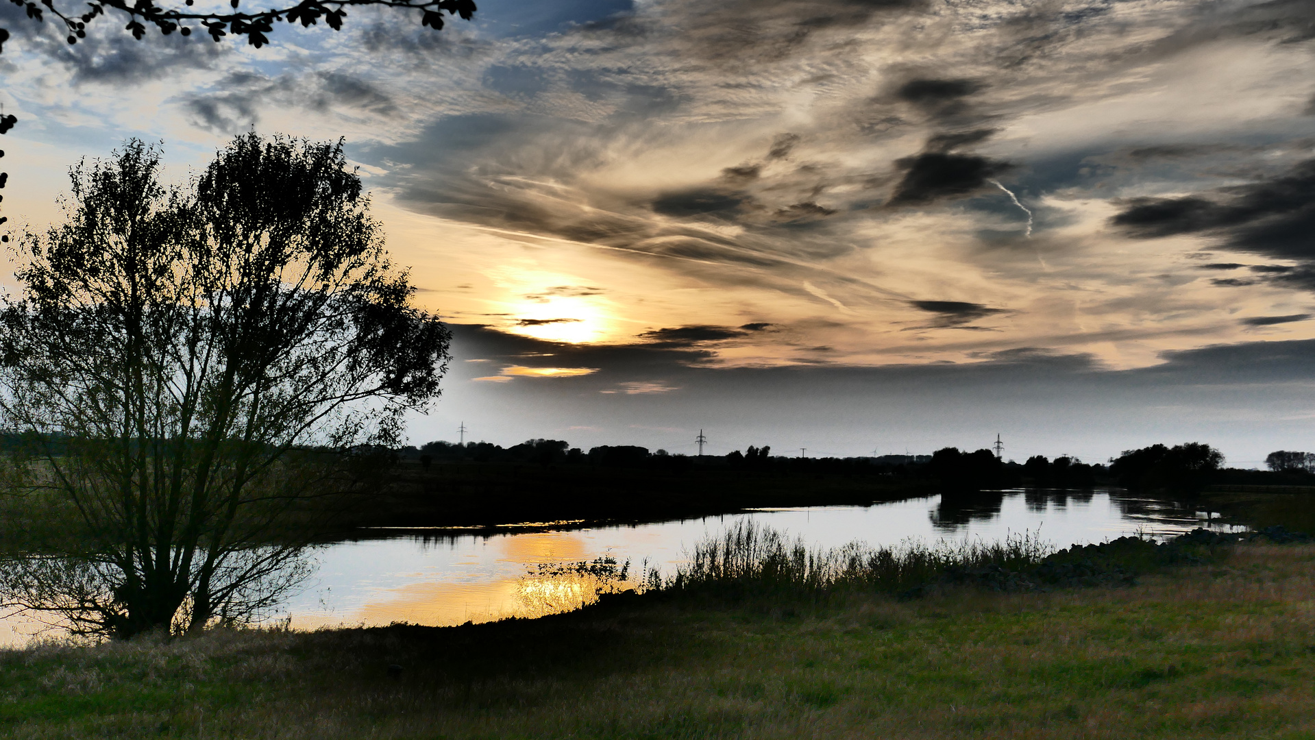 Sonnenspiegelung in der Aller bei Eitze