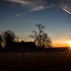 Sonnenstern über der Pferdekoppel