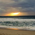 Sonnenstrahlen am Himmel über Sylt