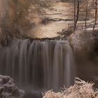 Sonnenstrahlen am Wasserfall