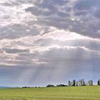 Sonnenstrahlen durch die Wolken