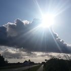 Sonnenstrahlen über den Wolken