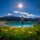 Sonnenstrahlen über Lago di Resia 