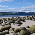 Sonnenstrand mit Boulders