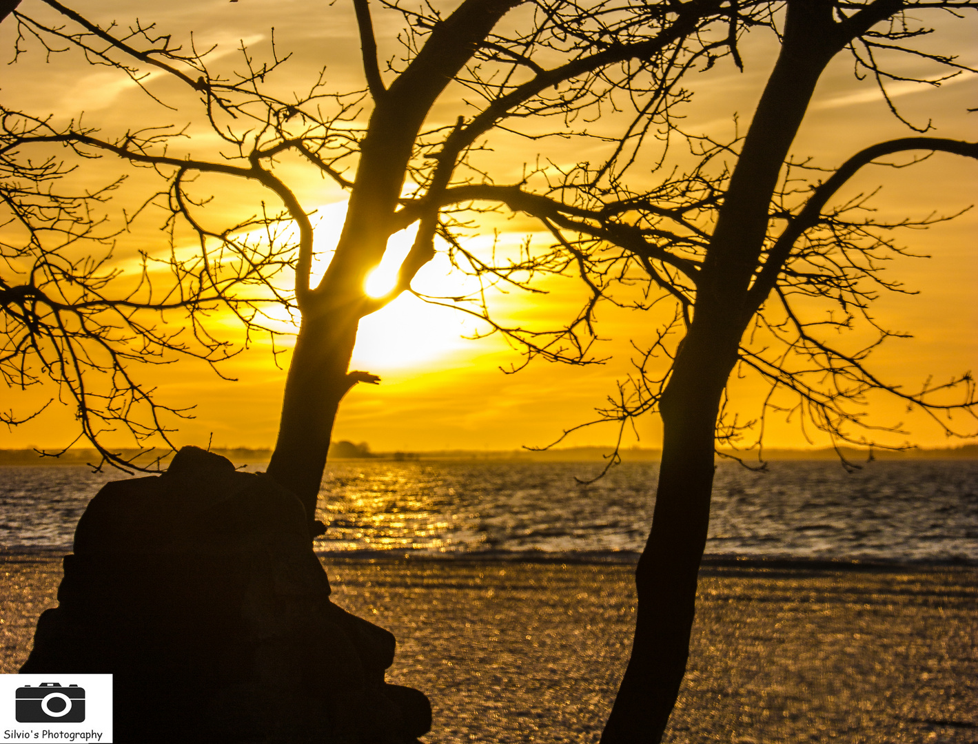 Sonnenuntergang am Achterwasser