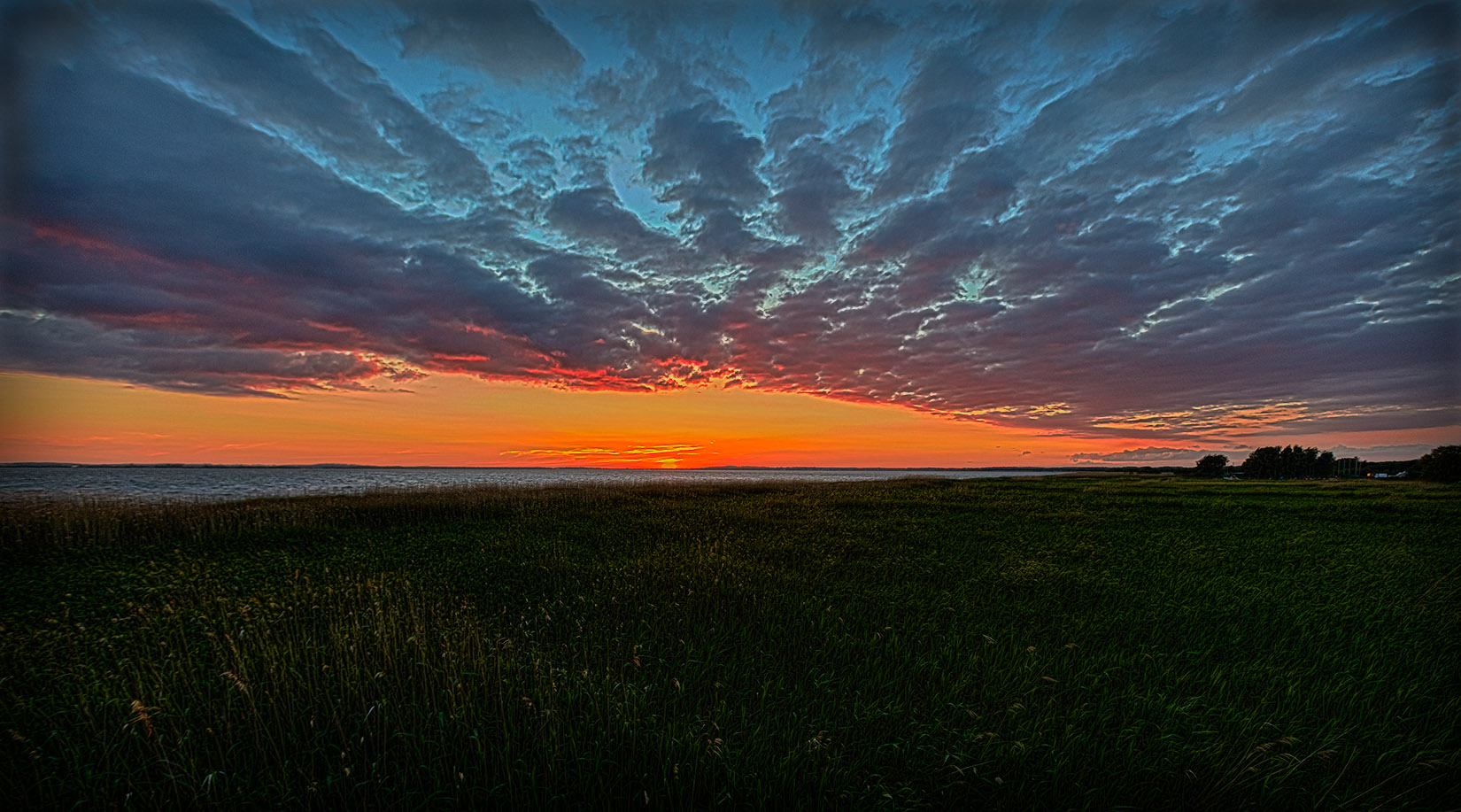 Sonnenuntergang am Achterwasser