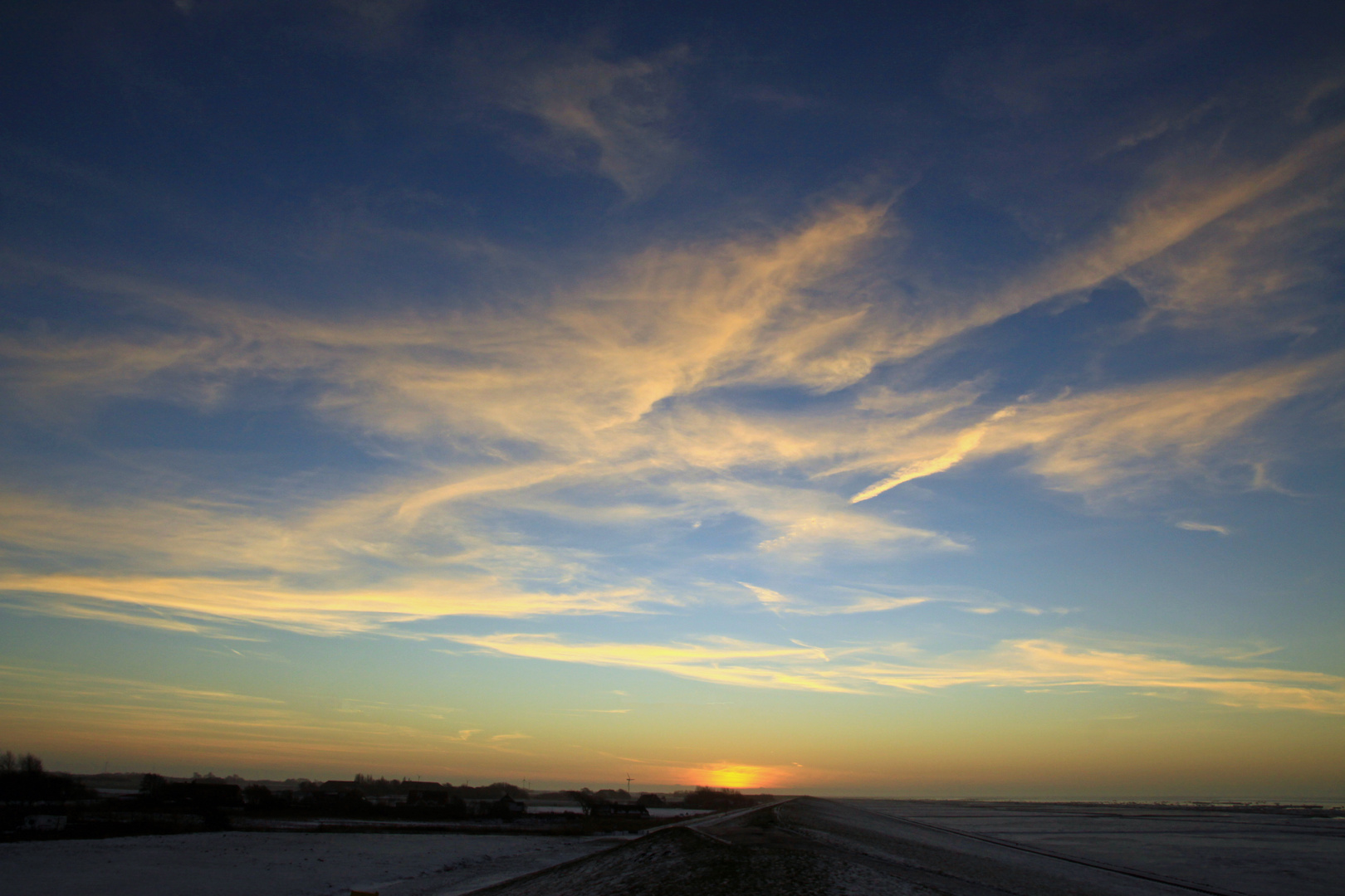 Sonnenuntergang am Deich