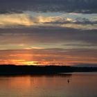 sonnenuntergang am dolgensee in brandenburg