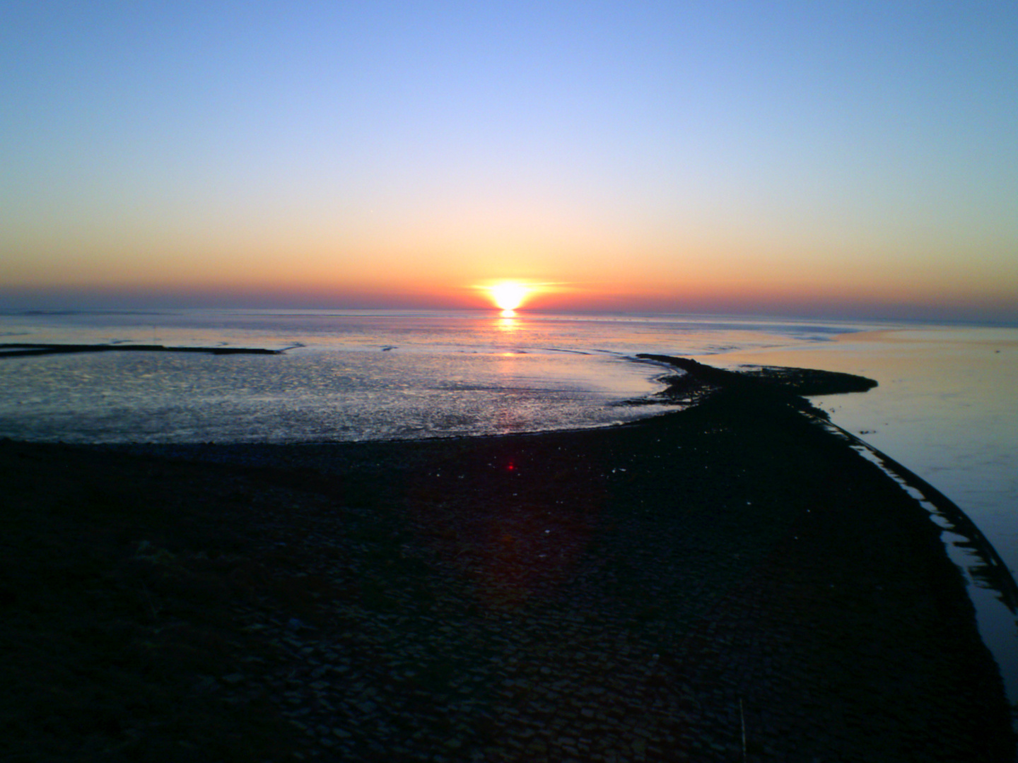 Sonnenuntergang am Eidersperrwerk