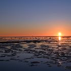 Sonnenuntergang am Hafen von Strucklahnungshörn