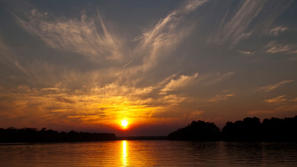 Sonnenuntergang am Kafue / Sambia