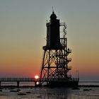 Sonnenuntergang am Leuchtturm von Dorum